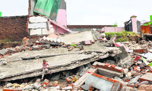 Houses reduced to rubble after floods in Jammu. Many areas in the district are still awaiting relief.