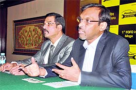 YVS Vijay Kumar, CEO, Mahindra First Choice Services, addresses a press conference in Ludhiana on Tuesday. 