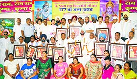 Eminent personalities who were awarded by the Pandit Shradha Ram Phillauri Memorial Welfare Society at Navdurga Mandir in Ludhiana on Tuesday.