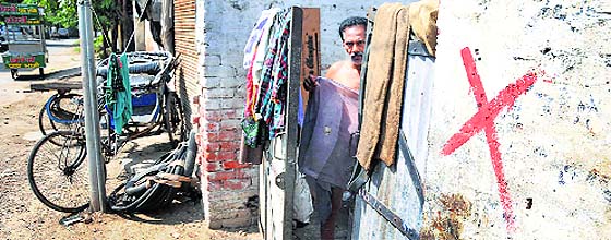 One of the houses that is marked for demolition at Prem Nagar in Ludhiana.