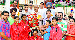Cabinet Minister Chunni Lal Bhagat hands over prizes to winners at Punjab State Rural Games for Girls in Amritsar on Wednesday