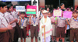 A student of DAV School dressed up as Gandhi at Gandhi Jayanti celebrations in Amritsar on Wednesday