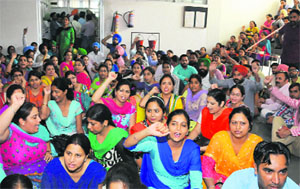 Members of the teachers union protest at the office of the DPI in Mohali on Wednesday