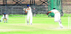 Players in action during a match of the JP Atray Memorial Cricket Tournament at Sector 16 in Chandigarh on Wednesday