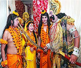 Artists share a lighter moment back stage during the Ramlilla at Adarsh Nagar Ramlilla Committee, North Delhi, on Wednesday.