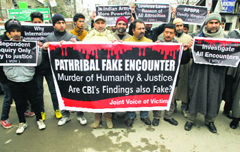 State human rights group protests against the Armys verdict on the alleged fake encounter in Pathribal, Kashmir.