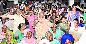 Elderly women in a jubilant mood during a state-level programme on the occasion of International Senior Citizens Day in Jalandhar on Wednesday. 