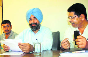 Ajmer Singh Bhagpur, chairman of Verka milk plant, addresses the media in Ludhiana.