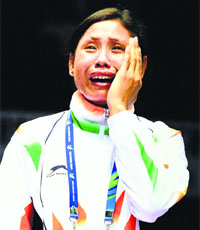 Sarita cries after refusing to accept the bronze medal.