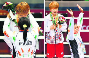 Sarita gifts her bronze to Park Jina and then walks away, waving to the crowd.