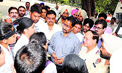 Students of Chinpurni Medical College talk to Research and Medical Education Minister Anil Joshi in Amritsar on Thursday