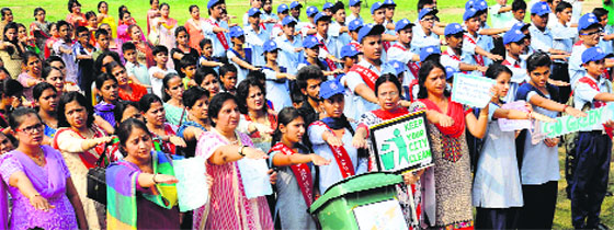 Students and staff members take the swachhta pledge at Government Model Senior Secondary School, Sector 19, Chandigarh, on Thursday. Tribune Photo: Manoj Mahajan