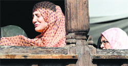 Devotees offer prayers at the shrine of Shah-e-Hamdan in Srinagar on Thursday. PTI 