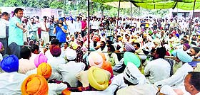 Bhagwant Mann, AAP MP, addresses the protesters in Samrala on Thursday. 