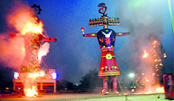 Effigies of demon King Ravana, Meghnad and Kumbhkarna burn during the Dasehra celebrations in Ranjit Avenue in Amritsar 