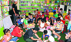 One Up library is celebrating the international bookmark month with children making bookmarks in association with schools from the US and Croatia in Amritsar on Friday