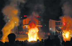 Effigies of Ravana, Kumbhkarna and Meghnath go up in flames in Shimla on Friday. Chief Minister Virbhadra Singh and his family members participated in the Dasehra festivities at Jakhoo Temple. Photo: Amit Kanwar