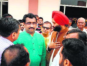 National BJP general secretary and RSS leader Ram Madhav talks to BJP and RSS leaders in Ambala City on Friday