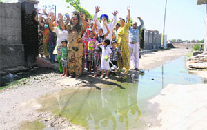 Residents of Balraj Nagar raise slogans against the Municipal Corporation due to the stagnant sewage at Street No. 6 in Bathinda on Saturday.