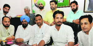 Gidderbaha Congress MLA Amarinder Singh Raja Warring interacts with media persons after meeting party workers as an observer in Bathinda on Saturday.