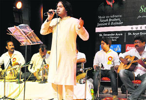 Param Chandel performs during the Surmai Sham programme in Chandigarh on Saturday.