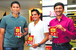 Sanam Singh, Asiad tennis silver medallist (centre), former cricketer Venkatesh Prasad (left) and Vivek Atray, author, during a book signing ceremony at Browser in Sector 8, Chandigarh, on Saturday.