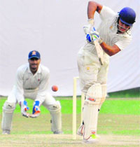 A player in action during a match on the LIC ground in Sector 26, Chandigarh, on Saturday.