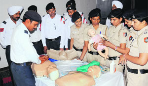 Police personnel take part in a first-aid training workshop at the Police Lines in Sector 29, Chandigarh, on Saturday. 