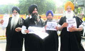Shiromani Akali Dal (Amritsar) activists in black robes to protest Prime Minister Narendra Modi's visit to Karnal on Saturday.