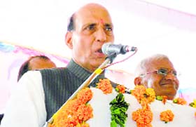 Union Home Minister Rajnath Singh addresses a rally in Kalayat on Saturday.
