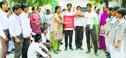 National award winner Kusum Lata interacts with students of Government High School, Sarabha Nagar. Photo: Inderjeet Verma