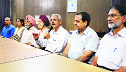 Delegates from the Indian Doctors for Peace and Development who returned from J&K address a press conference in Ludhiana. Photo: Inderjeet Verma