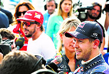 Sebastian Vettels likely move to Ferrari at the end of the season leaves an open question mark over the future of Fernando Alonso (L), who could now return to his old team McLaren