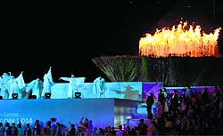 The flame is slowly extinguished during the closing ceremony;