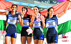 Gold medallists Poovamma Machettira, Lukka Tintu, Mandeep Kaur and Priyanka Pawar