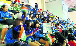 South Korean school and college students double up as volunteers during the games