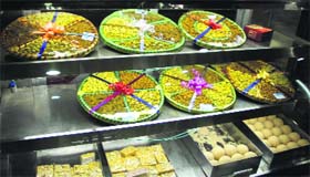 A view of dry fruits being attractively packaged at a shop during the festive season in Bathinda.