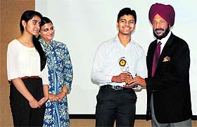 Milkha Singh gives away prizes to students on the concluding day of the Model UN Conference at Strawberry Fields High School in Sector 26, Chandigarh, on Sunday