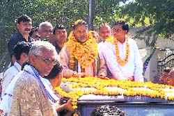 State BJP chief Ram Bilas Sharma during an election campaign in Rivasa village near Mahendragarh on Sunday