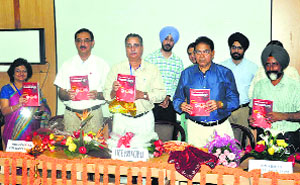 Officials release a book on haematology during the annual conference of the North-West Chapter of the Indian Association of Pathologists and Microbiologists in Ludhiana.