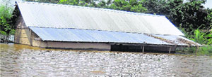 A submerged house in the flooded area of Misamari village of Nagaon district in Assam.