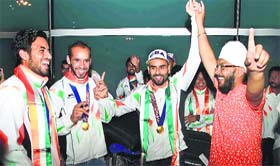 Gurbaj Singh, Ramandeep Singh and teammates in a Bhangra Jig.