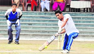 A batsman of Doon Presidency School plays a shot during a match in the 7th Rohitash Singh Memorial Inter-School Boys Super-8 Cricket Tournament at The Heritage School in Dehradun on Sunday.