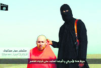 A file photo of Black-robed Jihadi John with a captured scribe. 