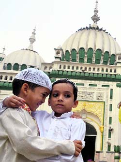 Brotherhood: Children celebrate inside a mosque on the occasion of Eid-ul-Zuha in Amritsar on Monday.