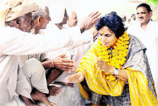 BJP candidate Latika Sharma during her campaign at Hangoli village near Raipur Rani on Monday. A Tribune photograph