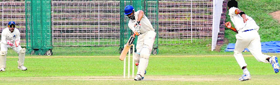 A batsman plays a shot during a cricket match at Sector 16 in Chandigarh on Monday. Tribune Photo: S Chandan