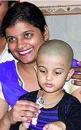 Jahnvi Ahuja with her mother in New Delhi on Monday. 