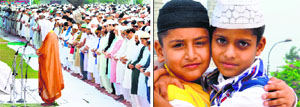 Muslims offer prayers; and (right) children greet each other on Eid-ul-Zuha in Jammu on Monday. Tribune photos: Inderjeet Singh