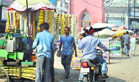Vendors, shopkeepers set up their counters on roads during the festive season.